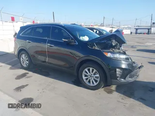 2019 Kia Sorento LX with VIN 5XYPG4A55KG523989, listed as a IAAI auction lot 42164908 with 70,148 mi miles and . Bid and sale history available at DreamBid. Image 1.