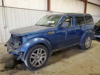 2009 Dodge Nitro SLT with VIN 1D8GU58K99W542909, listed as a Copart auction lot 79526084 with 172,511 mi miles and Salvage title. Bid and sale history available at DreamBid. Image 1.