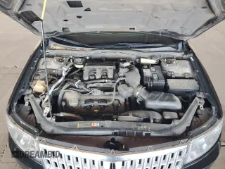 2008 Lincoln MKZ z VIN 3LNHM26TX8R646805, wystawiony jako Copart lot #57482325 z przebiegiem 124 200 mil mil oraz Szkoda całkowita • Salvage title. Historia ofert i sprzedaży dostępna na DreamBid. Obrazek 11.