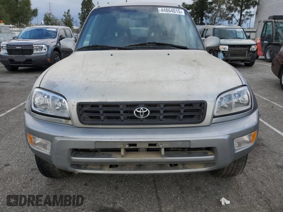 1999 Toyota RAV4 with VIN JT3GP10V0X7054819, listed as a Copart auction lot 44864015 with 140,095 mi miles and Salvage Title. Bid and sale history available at DreamBid. Image 5.