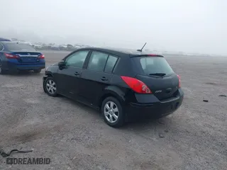 2009 Nissan Versa 1.8 S with VIN 3N1BC13E99L423269, listed as a IAAI auction lot 41490644 with 124,241 mi miles. Bid and sale history available at carsss.com. Image 3.
