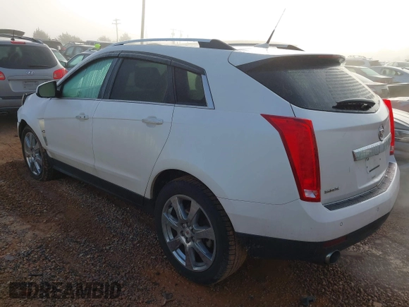 2011 Cadillac SRX Performance Collection with VIN 3GYFNBEY4BS600709, listed as a IAAI auction lot 40858453 with 148,769 mi miles. Bid and sale history available at carsss.com. Image 3.