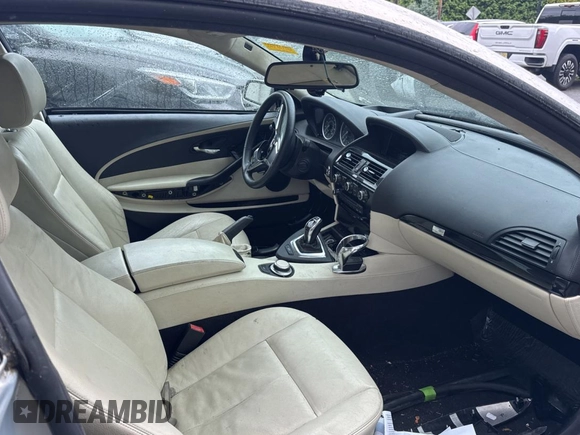 2008 BMW 6 Series 650i z VIN WBAEA53558CV90985, wystawiony jako Copart lot #57308835 z przebiegiem 99 340 mil mil oraz Czysty tytuł • Clean title. Historia ofert i sprzedaży dostępna na DreamBid. Obrazek 5.