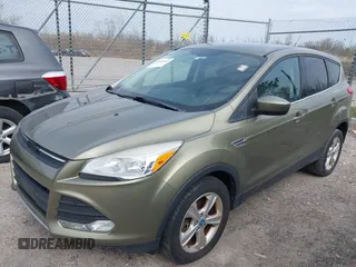 2013 Ford Escape SE with VIN 1FMCU9GX7DUC32369, listed as a IAAI auction lot 42144967 with 156,275 mi miles. Bid and sale history available at carsss.com. Image 2.