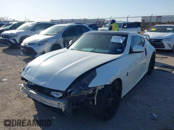 2012 Nissan 370Z Touring with VIN JN1AZ4EH0CM560830, listed as a IAAI auction lot 41770890 with 130,875 mi miles. Bid and sale history available at carsss.com. Image 17.