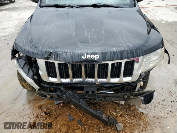 2012 Jeep Grand Cherokee Limited z VIN 1C4RJFBT7CC190025, wystawiony jako Copart lot #47460405 z przebiegiem 140 048 mil mil oraz Szkoda całkowita • Salvage title. Historia ofert i sprzedaży dostępna na DreamBid. Obrazek 11.