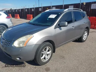 2009 Nissan Rogue S with VIN JN8AS58VX9W440060, listed as a IAAI auction lot 42067756 with 117,849 mi miles. Bid and sale history available at carsss.com. Image 2.