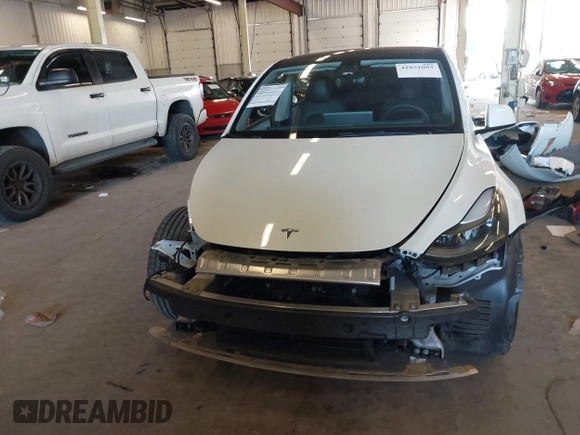 2021 Tesla Model Y Performance with VIN 5YJYGDEF4MF263473, listed as a IAAI auction lot 41851083 with 39,289 mi miles and . Bid and sale history available at DreamBid. Image 13.