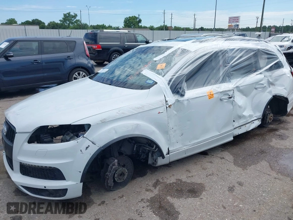 2015 Audi Q7 Prestige with VIN WA1WMAFE9FD023781, listed as a IAAI auction lot 42453124 with Not provided miles and . Bid and sale history available at DreamBid. Image 16.