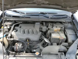 2010 Nissan Sentra S with VIN 3N1AB6AP4AL664046, listed as a Copart auction lot 57210235 with 142,977 mi miles and Salvage title. Bid and sale history available at DreamBid. Image 11.