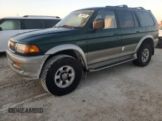 1999 Mitsubishi Montero Limited z VIN JA4LS41RXXP010154, wystawiony jako Copart lot #77666734 z przebiegiem Nie podano mil oraz Szkoda całkowita • Salvage title. Historia ofert i sprzedaży dostępna na DreamBid. Obrazek 1.