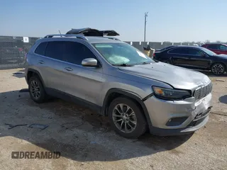 2019 Jeep Cherokee Latitude Plus z VIN 1C4PJLLB0KD419780, wystawiony jako IAAI lot #41794727 z przebiegiem 128 630 mil mil oraz . Historia ofert i sprzedaży dostępna na DreamBid. Obrazek 1.