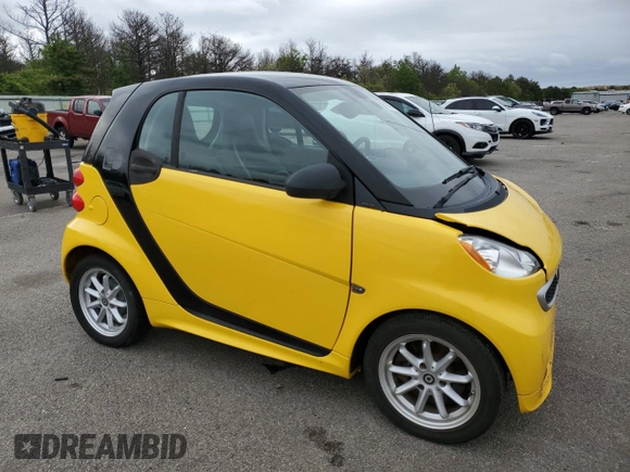 2015 Smart fortwo Passion with VIN WMEEJ9AA5FK831751, listed as a Copart auction lot 58025575 with 55,512 mi miles and Salvage title. Bid and sale history available at DreamBid. Image 4.