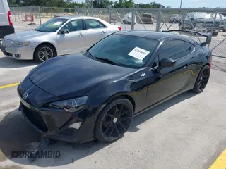 2014 Scion FR-S z VIN JF1ZNAA10E8703778, wystawiony jako IAAI lot #42264695 z przebiegiem 117 889 mil mil oraz . Historia ofert i sprzedaży dostępna na DreamBid. Obrazek 2.