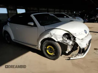 2013 Volkswagen Beetle 2.5L with VIN 3VW5P7AT2DM811768, listed as a Copart auction lot 54609125 with 60,505 mi miles and Salvage Title. Bid and sale history available at DreamBid. Image 4.