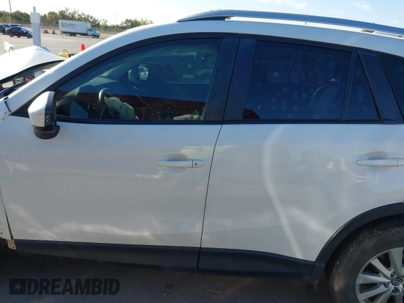 2015 Mazda CX-5 Sport with VIN JM3KE2BE3F0449722, listed as a IAAI auction lot 41825810 with 181,949 mi miles and . Bid and sale history available at DreamBid. Image 15.