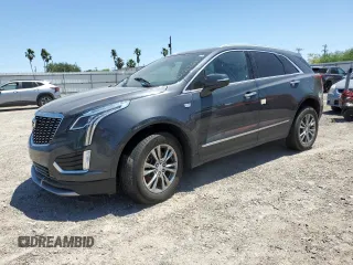 2023 Cadillac XT5 FWD Premium Luxury z VIN 1GYKNCRS0PZ173923, wystawiony jako Copart lot #52212695 z przebiegiem Nie podano mil oraz Szkoda całkowita • Salvage title. Historia ofert i sprzedaży dostępna na DreamBid. Obrazek 1.