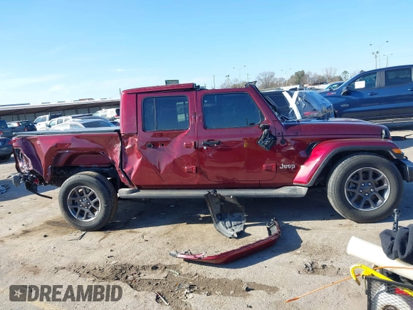 2021 Jeep Gladiator Overland z VIN 1C6HJTFGXML595781, wystawiony jako IAAI lot #41667696 z przebiegiem 31 438 mil mil oraz . Historia ofert i sprzedaży dostępna na DreamBid. Obrazek 13.
