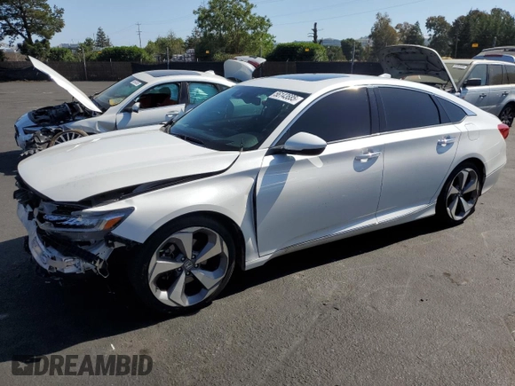 2018 Honda Accord Touring with VIN 1HGCV1F9XJA018710, listed as a Copart auction lot 56143685 with 146,625 mi miles and Salvage title. Bid and sale history available at DreamBid. Image 1.
