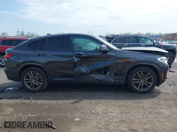 2021 BMW X4 xDrive30i z VIN 5UX2V1C02M9G88260, wystawiony jako IAAI lot #41991270 z przebiegiem 48 817 mil mil oraz . Historia ofert i sprzedaży dostępna na DreamBid. Obrazek 13.