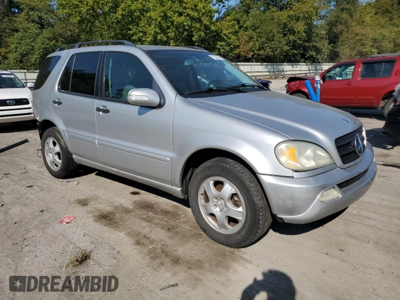 2002 Mercedes-Benz M-Class with VIN 4JGAB54E52A337189, listed as a Copart auction lot 71348154 with 220,378 mi miles and Salvage Title. Bid and sale history available at carsss.com. Image 4.