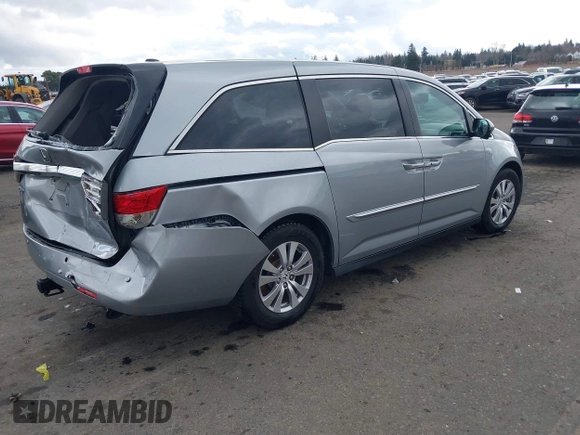 2016 Honda Odyssey EX-L with VIN 5FNRL5H64GB048004, listed as a IAAI auction lot 41676712 with 129,343 mi miles. Bid and sale history available at carsss.com. Image 4.