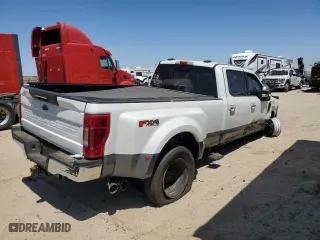 2021 Ford Super Duty F-450 DRW XL with VIN 1FT8W4DTXMED30296, listed as a Copart auction lot 58483974 with 25,593 mi miles and Salvage Title. Bid and sale history available at carsss.com. Image 4.