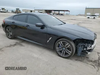 2022 BMW 8 Series 840i z VIN WBAGV4C01NCH18603, wystawiony jako Copart lot #51969445 z przebiegiem 19 502 mil mil oraz Tytuł czysty. Historia ofert i sprzedaży dostępna na DreamBid. Obrazek 4.