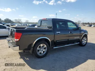 2010 Nissan Titan SE with VIN 1N6BA0ED4AN312650, listed as a Copart auction lot 47284915 with 266,394 mi miles and Salvage Title. Bid and sale history available at carsss.com. Image 3.
