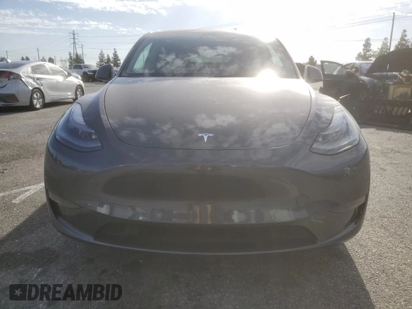 2022 Tesla Model Y Performance with VIN 7SAYGDEF3NF490643, listed as a Copart auction lot 46975825 with 50,792 mi miles and Salvage Title. Bid and sale history available at DreamBid. Image 5.