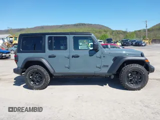 2024 Jeep Wrangler Sport S with VIN 1C4PJXDN2RW351741, listed as a IAAI auction lot 42122651 with 4,241 mi miles and . Bid and sale history available at DreamBid. Image 14.