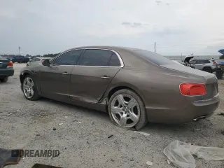 2014 Bentley Flying Spur с VIN SCBEC9ZA9EC091162, выставлен на аукционе Copart как лот 55941855 с пробегом 135 032 миль миль и Списание • Salvage title. История ставок и продаж доступна на DreamBid. Изображение 2.