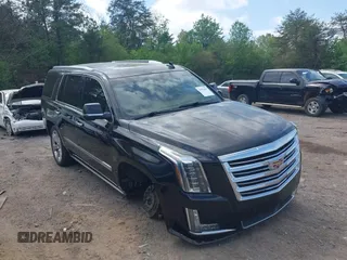 2016 Cadillac Escalade Platinum z VIN 1GYS3DKJ7GR374845, wystawiony jako IAAI lot #41951693 z przebiegiem 93 820 mil mil oraz . Historia ofert i sprzedaży dostępna na DreamBid. Obrazek 6.