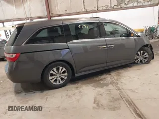 2011 Honda Odyssey Touring Elite with VIN 5FNRL5H96BB030946, listed as a IAAI auction lot 41465741 with 122,678 mi miles and . Bid and sale history available at DreamBid. Image 4.