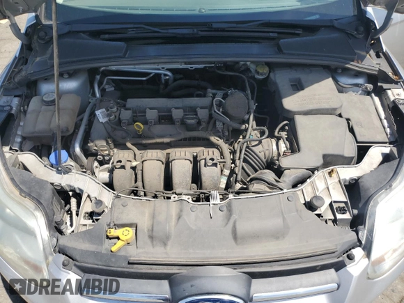 2012 Ford Focus SE z VIN 1FAHP3K2XCL270196, wystawiony jako Copart lot #57319575 z przebiegiem 80 364 mil mil oraz Szkoda całkowita • Salvage title. Historia ofert i sprzedaży dostępna na DreamBid. Obrazek 11.