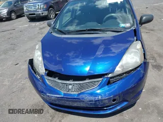 2013 Honda Fit with VIN JHMGE8H38DC047079, listed as a IAAI auction lot 42037073 with 32,794 mi miles. Bid and sale history available at carsss.com. Image 6.