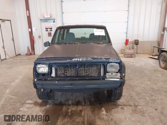 1996 Jeep Cherokee SE z VIN 1J4FJ28S8TL200825, wystawiony jako IAAI lot #42513038 z przebiegiem 226 914 mil mil oraz . Historia ofert i sprzedaży dostępna na DreamBid. Obrazek 6.