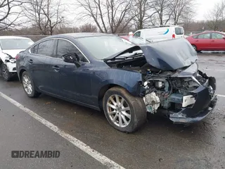 2016 Mazda Mazda6 i Sport with VIN JM1GJ1U58G1453603, listed as a IAAI auction lot 41576561 with 113,383 mi miles. Bid and sale history available at carsss.com. Image 1.