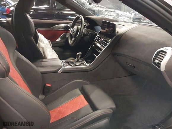 2023 BMW M8 Competition with VIN WBSDZ0C02PCM75573, listed as a IAAI auction lot 41618692 with 8,292 mi miles. Bid and sale history available at carsss.com. Image 5.