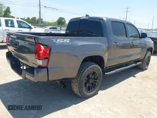 2021 Toyota Tacoma SR with VIN 3TYAX5GN3MT015565, listed as a IAAI auction lot 42241436 with 46,921 mi miles and . Bid and sale history available at DreamBid. Image 4.