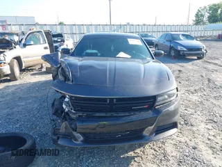 2021 Dodge Charger SXT z VIN 2C3CDXBGXMH659892, wystawiony jako IAAI lot #42011248 z przebiegiem 58 005 mil mil oraz . Historia ofert i sprzedaży dostępna na DreamBid. Obrazek 13.