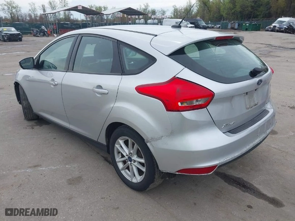 2015 Ford Focus SE with VIN 1FADP3K25FL345874, listed as a IAAI auction lot 41972589 with 155,001 mi miles. Bid and sale history available at carsss.com. Image 3.