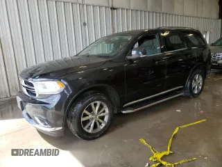 2014 Dodge Durango Limited z VIN 1C4RDJDG8EC596084, wystawiony jako Copart lot #57796975 z przebiegiem 122 783 mil mil oraz Nie do naprawy. Historia ofert i sprzedaży dostępna na DreamBid. Obrazek 1.