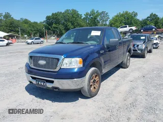 2007 Ford F-150 XLT with VIN 1FTPX14557NA43039, listed as a IAAI auction lot 42592557 with 133,301 mi miles and . Bid and sale history available at DreamBid. Image 2.