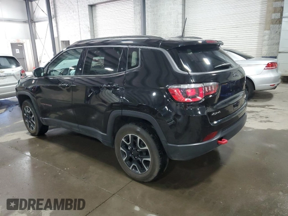 2019 Jeep Compass Trailhawk with VIN 3C4NJDDB4KT647187, listed as a Copart auction lot 50260575 with 63,098 mi miles and Salvage Title. Bid and sale history available at carsss.com. Image 2.