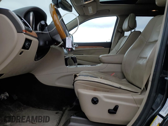 2011 Jeep Grand Cherokee Overland with VIN 1J4RS6GG1BC636963, listed as a Copart auction lot 87654425 with 189,736 mi miles and Salvage Title. Bid and sale history available at DreamBid. Image 7.