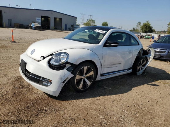 2012 Volkswagen Beetle 2.0T Turbo w/Sun/Sound with VIN 3VWV67AT5CM658403, listed as a Copart auction lot 71611614 with 10,878 mi miles and Salvage Title. Bid and sale history available at carsss.com. Image 1.