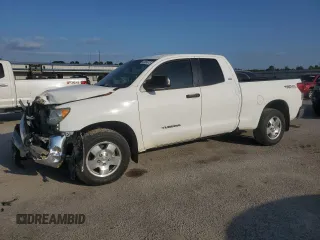 2013 Toyota Tundra z VIN 5TFRM5F10DX063122, wystawiony jako Copart lot #52004915 z przebiegiem 473 019 mil mil oraz Szkody całkowita. Historia ofert i sprzedaży dostępna na DreamBid. Obrazek 1.