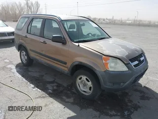 2002 Honda CR-V LX z VIN JHLRD78562C015613, wystawiony jako IAAI lot #41720551 z przebiegiem 390 366 mil mil oraz . Historia ofert i sprzedaży dostępna na DreamBid. Obrazek 1.
