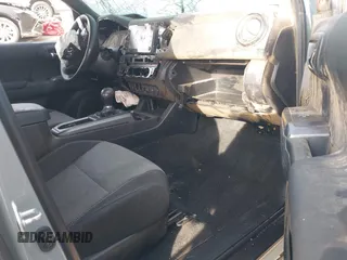 2022 Toyota Tacoma SR with VIN 3TYCZ5AN2NT096491, listed as a IAAI auction lot 42093897 with 47,041 mi miles and . Bid and sale history available at DreamBid. Image 5.